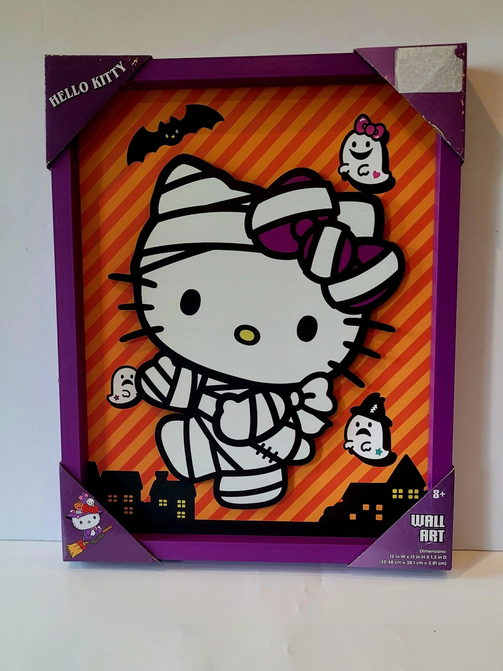 Hello Kitty Mummy Wall Art - Purple Frame, Orange Background